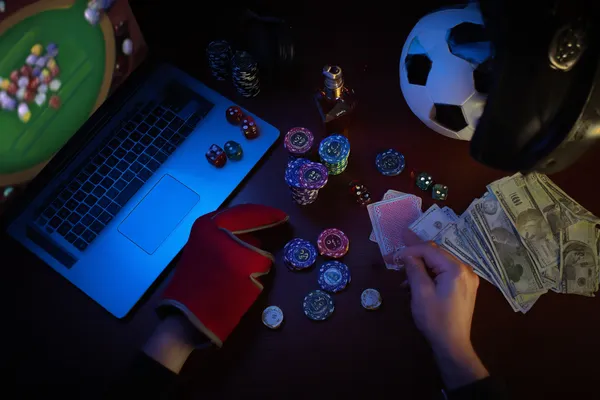 TKPK Live Games — Take part in high-energy casino action A glowing roulette wheel with cascading chips, symbolizing the engaging live and instant-win games available on TKPK.